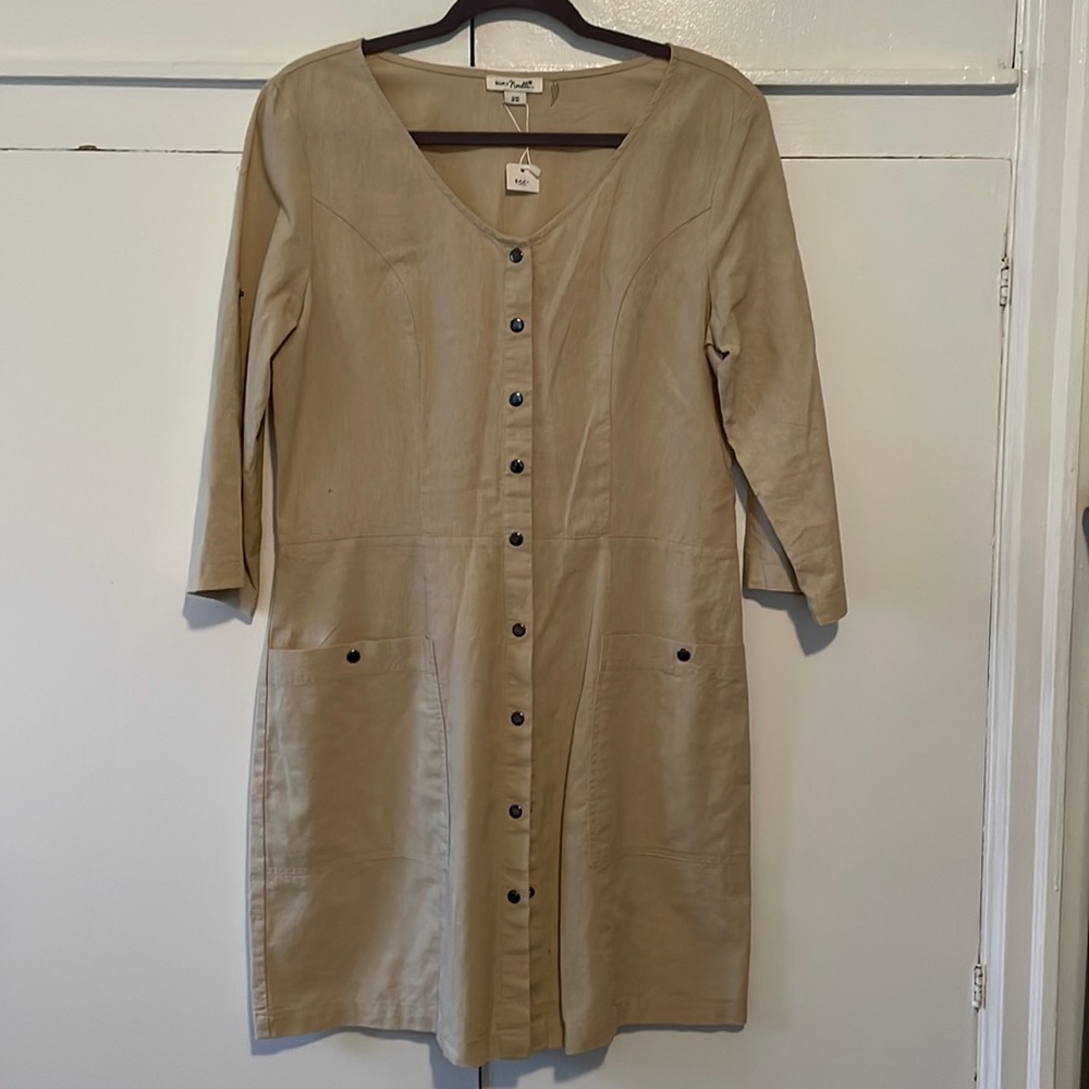Super cute dress. Tan color. New.